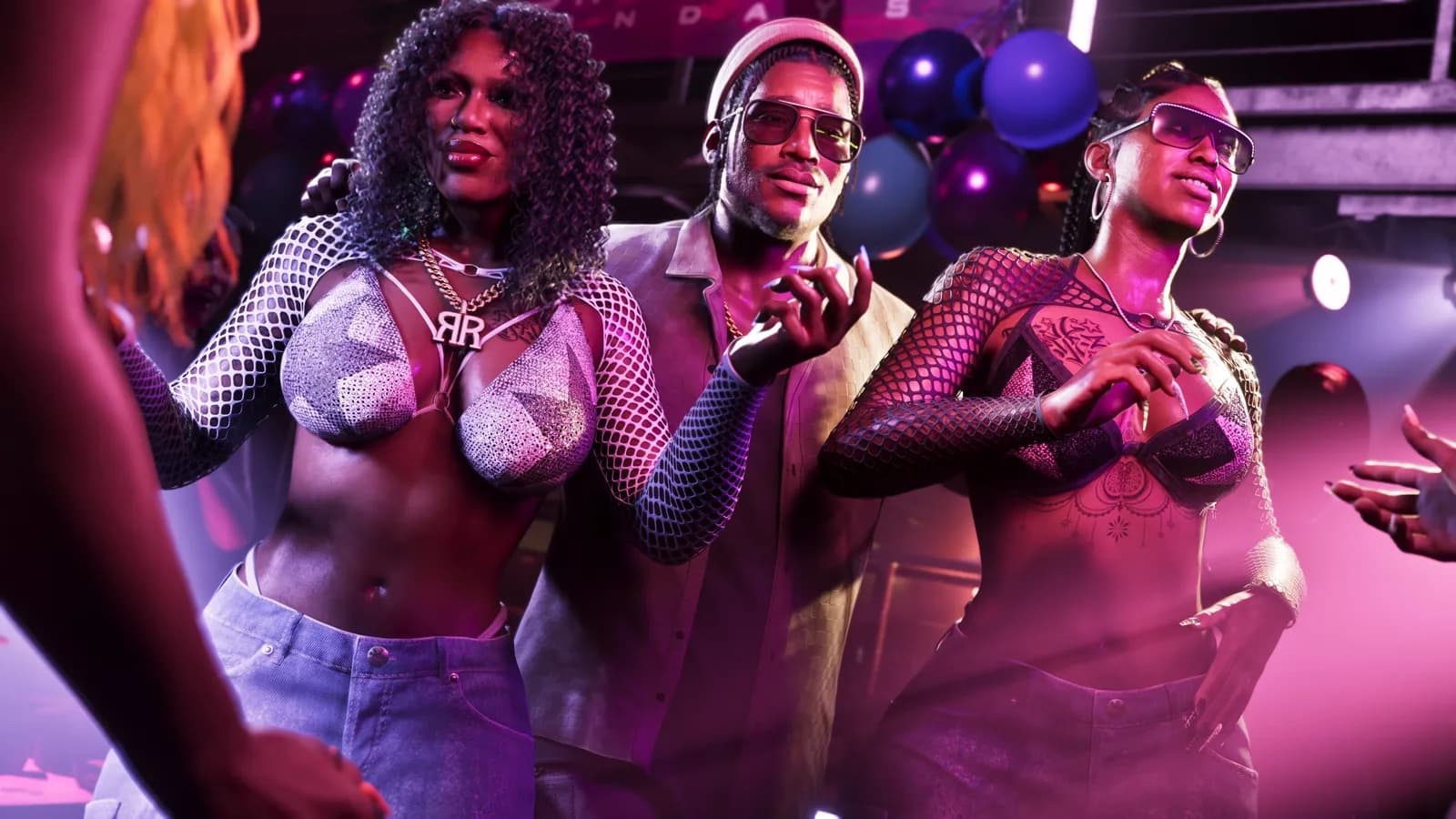 Dre'Quan between the two Real Dimez in a club.