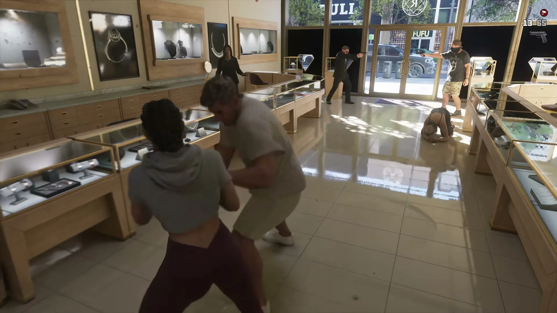 Lucia grabbing a man between jewelry display cases while masked robbers guard the door.