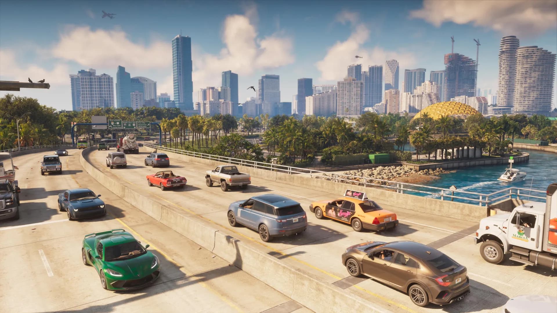 Heavy traffic on a highway bridge into Vice City: a green sports car, a taxi, a red convertible and a truck, the downtown skyline and a gold dome behind.
