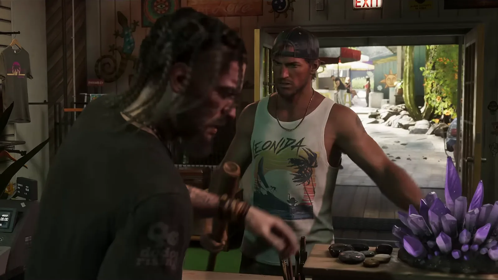Jason at a shop counter next to a cash register, from Trailer 2.